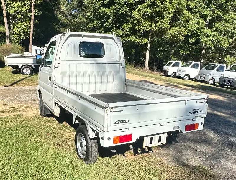 1999 Suzuki Carry 4WD, a white Kei Truck, for sale at Mayberry Mini Trucks in Mount Airy, NC (photo 7 of 17)