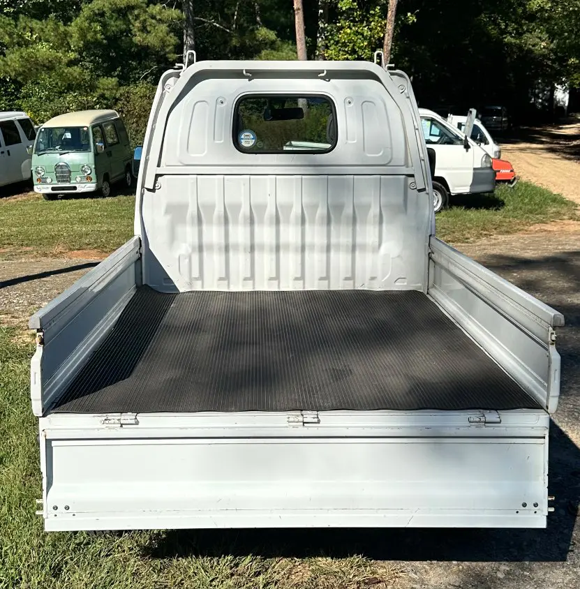 1999 Suzuki Carry 4WD, a white Kei Truck, for sale at Mayberry Mini Trucks in Mount Airy, NC (photo 9 of 17)