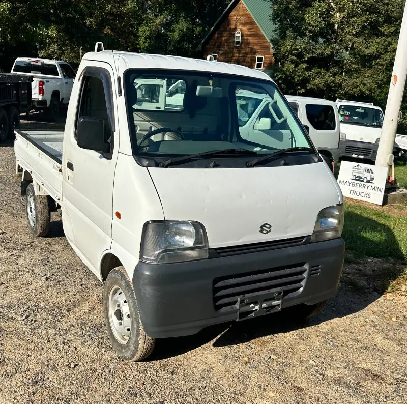 1999 Suzuki Carry 4WD, a white Kei Truck, for sale at Mayberry Mini Trucks in Mount Airy, NC (photo 3 of 18)