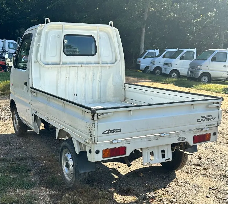 1999 Suzuki Carry 4WD, a white Kei Truck, for sale at Mayberry Mini Trucks in Mount Airy, NC (photo 6 of 18)