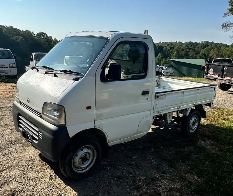 1999 Suzuki Carry 4WD, a white Kei Truck, for sale at Mayberry Mini Trucks in Mount Airy, NC (photo 8 of 18)