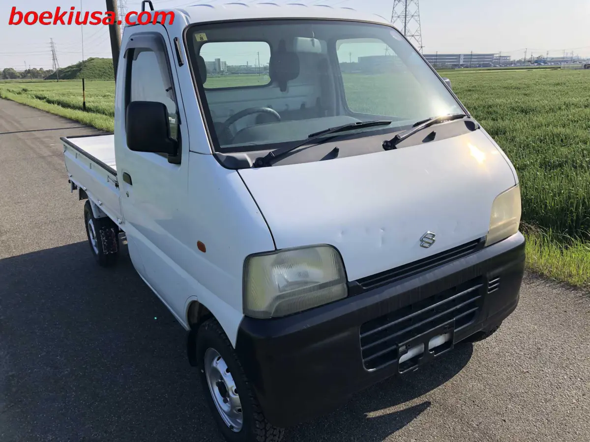 1999 Suzuki Carry 4x4, a white Kei Truck, for sale at Boeki USA in Paterson, NJ (photo 1 of 20)