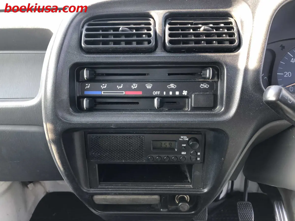 1999 Suzuki Carry 4x4, a white Kei Truck, for sale at Boeki USA in Paterson, NJ (photo 17 of 20)