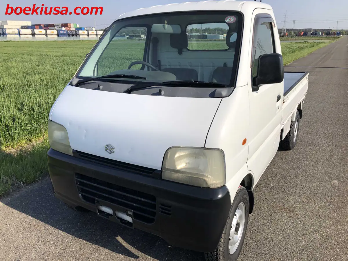 1999 Suzuki Carry 4x4, a white Kei Truck, for sale at Boeki USA in Paterson, NJ (photo 2 of 20)