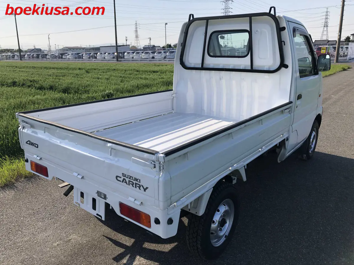 1999 Suzuki Carry 4x4, a white Kei Truck, for sale at Boeki USA in Paterson, NJ (photo 4 of 20)