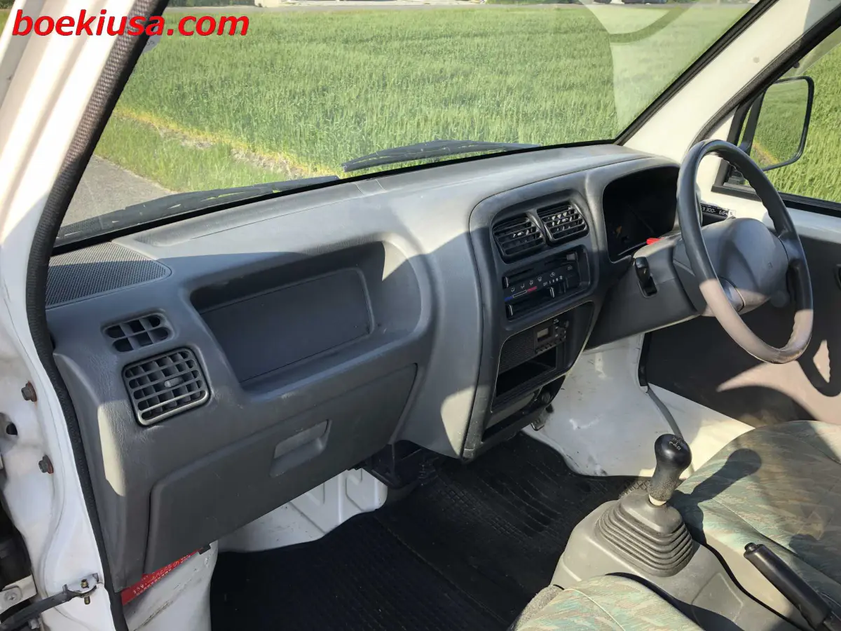 1999 Suzuki Carry 4x4, a white Kei Truck, for sale at Boeki USA in Paterson, NJ (photo 9 of 20)