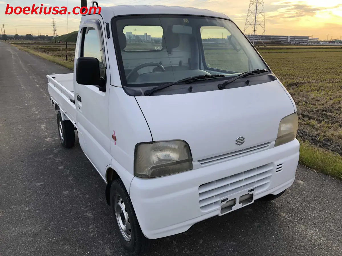 1999 Suzuki Carry 4x4, a white Kei Truck, for sale at Boeki USA in Paterson, NJ (photo 1 of 20)