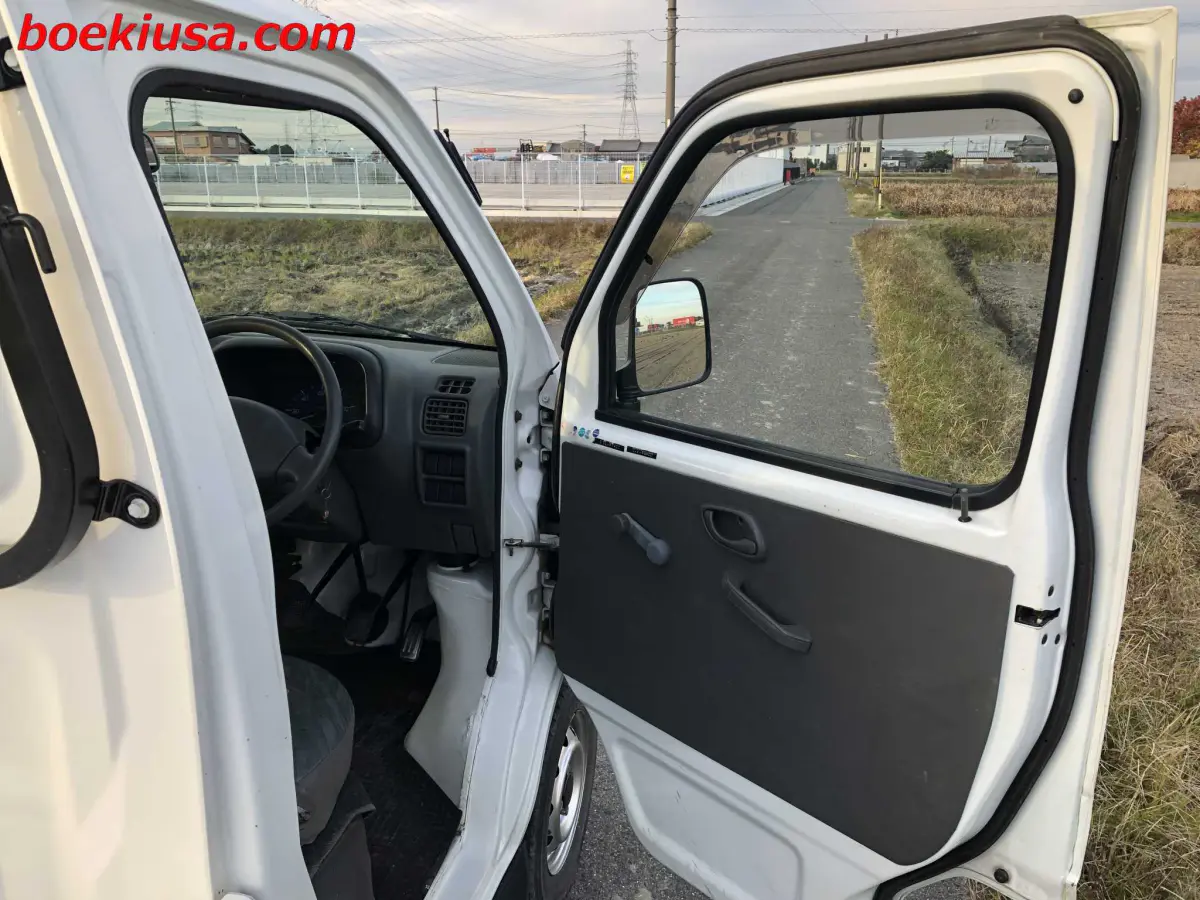 1999 Suzuki Carry 4x4, a white Kei Truck, for sale at Boeki USA in Paterson, NJ (photo 12 of 20)