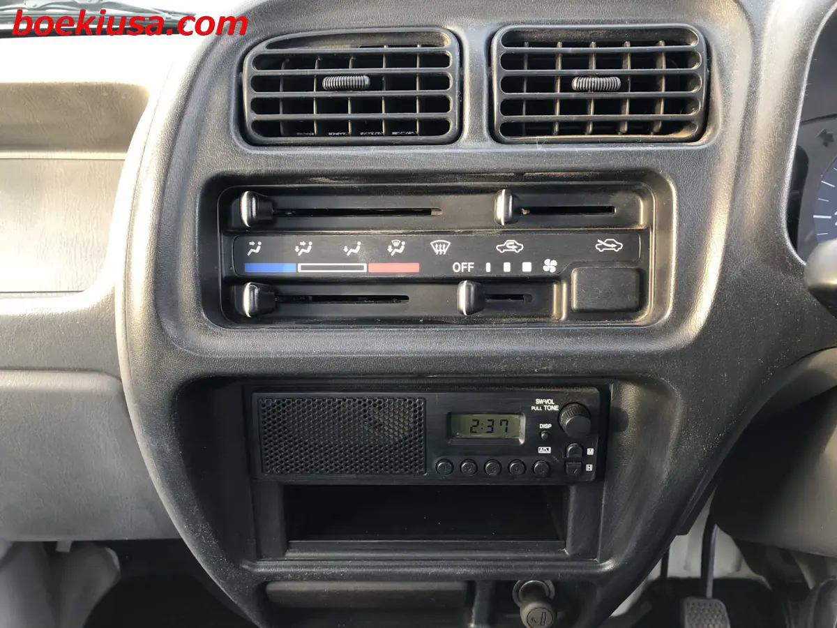 1999 Suzuki Carry 4x4, a white Kei Truck, for sale at Boeki USA in Paterson, NJ (photo 17 of 20)