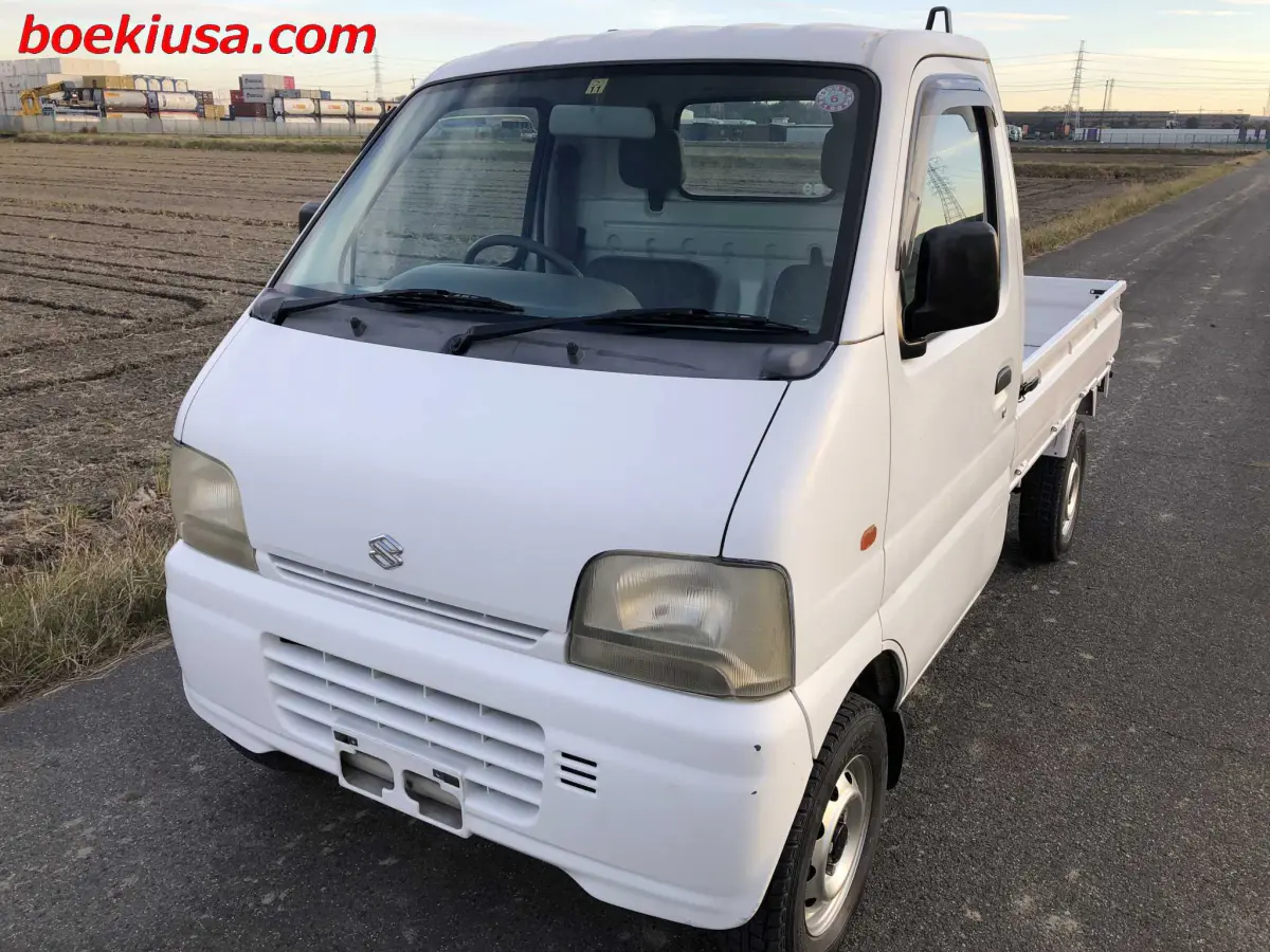 1999 Suzuki Carry 4x4, a white Kei Truck, for sale at Boeki USA in Paterson, NJ (photo 2 of 20)