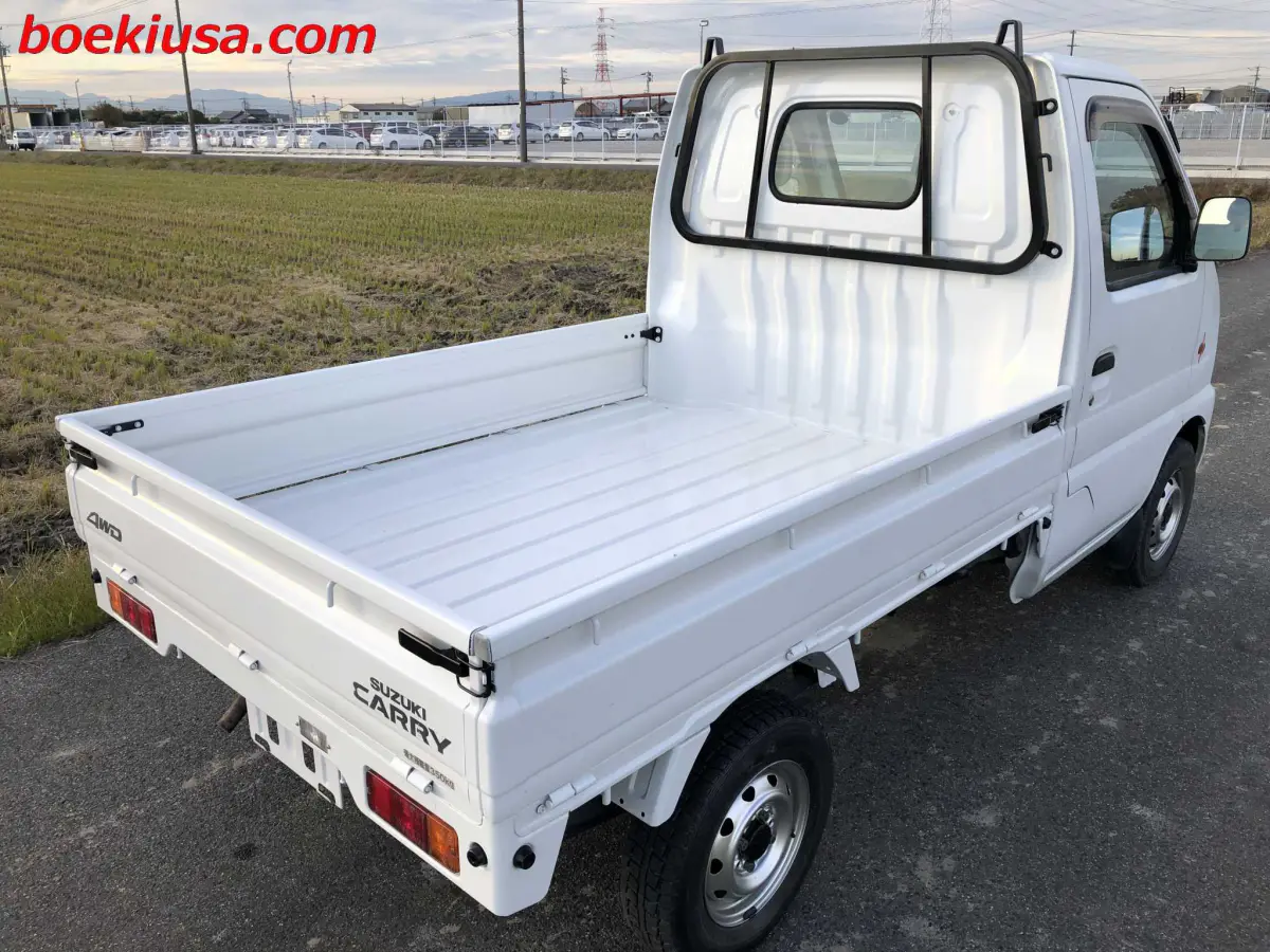 1999 Suzuki Carry 4x4, a white Kei Truck, for sale at Boeki USA in Paterson, NJ (photo 4 of 20)