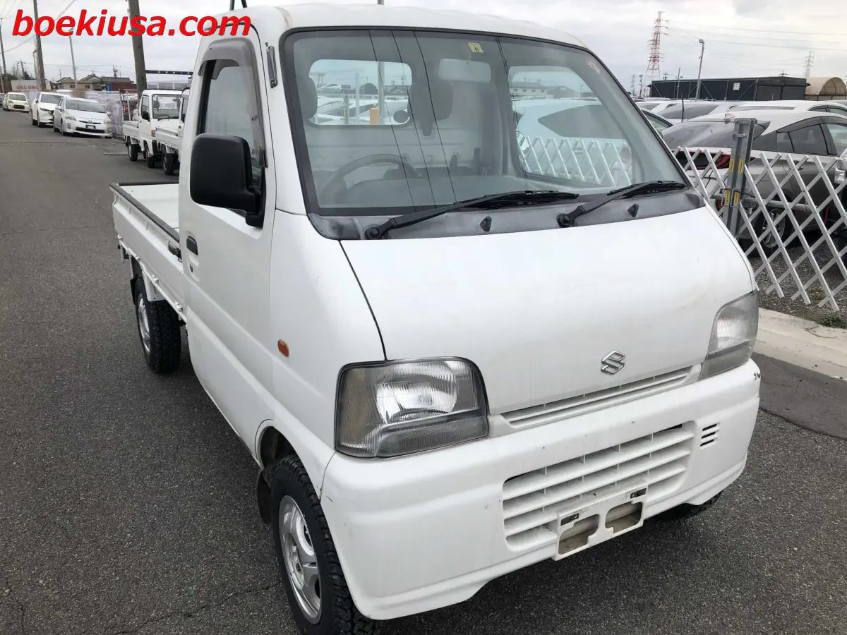1999 Suzuki Carry 4x4, a white Kei Truck, for sale at Boeki USA in Paterson, NJ (photo 1 of 20)