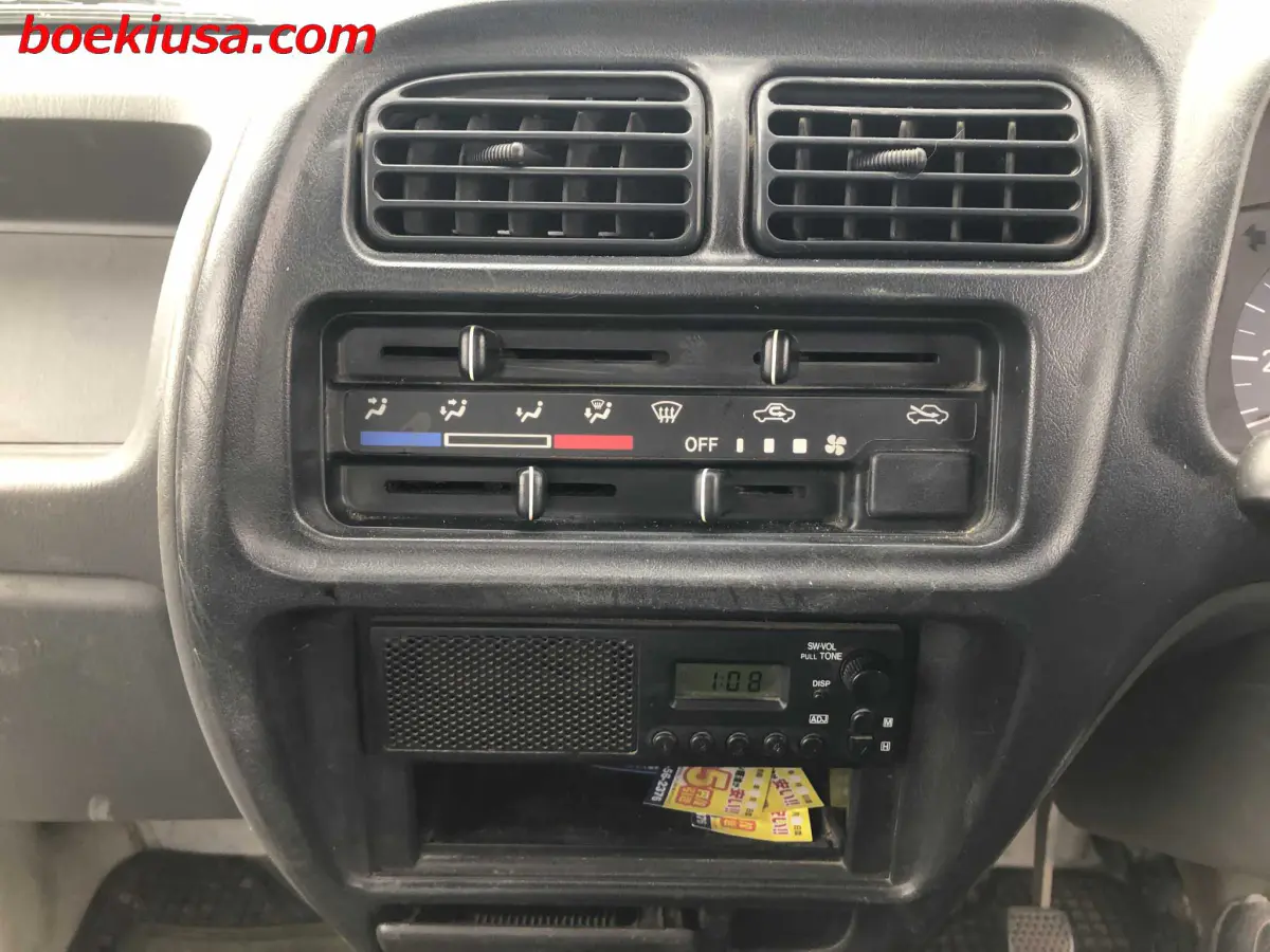 1999 Suzuki Carry 4x4, a white Kei Truck, for sale at Boeki USA in Paterson, NJ (photo 17 of 20)