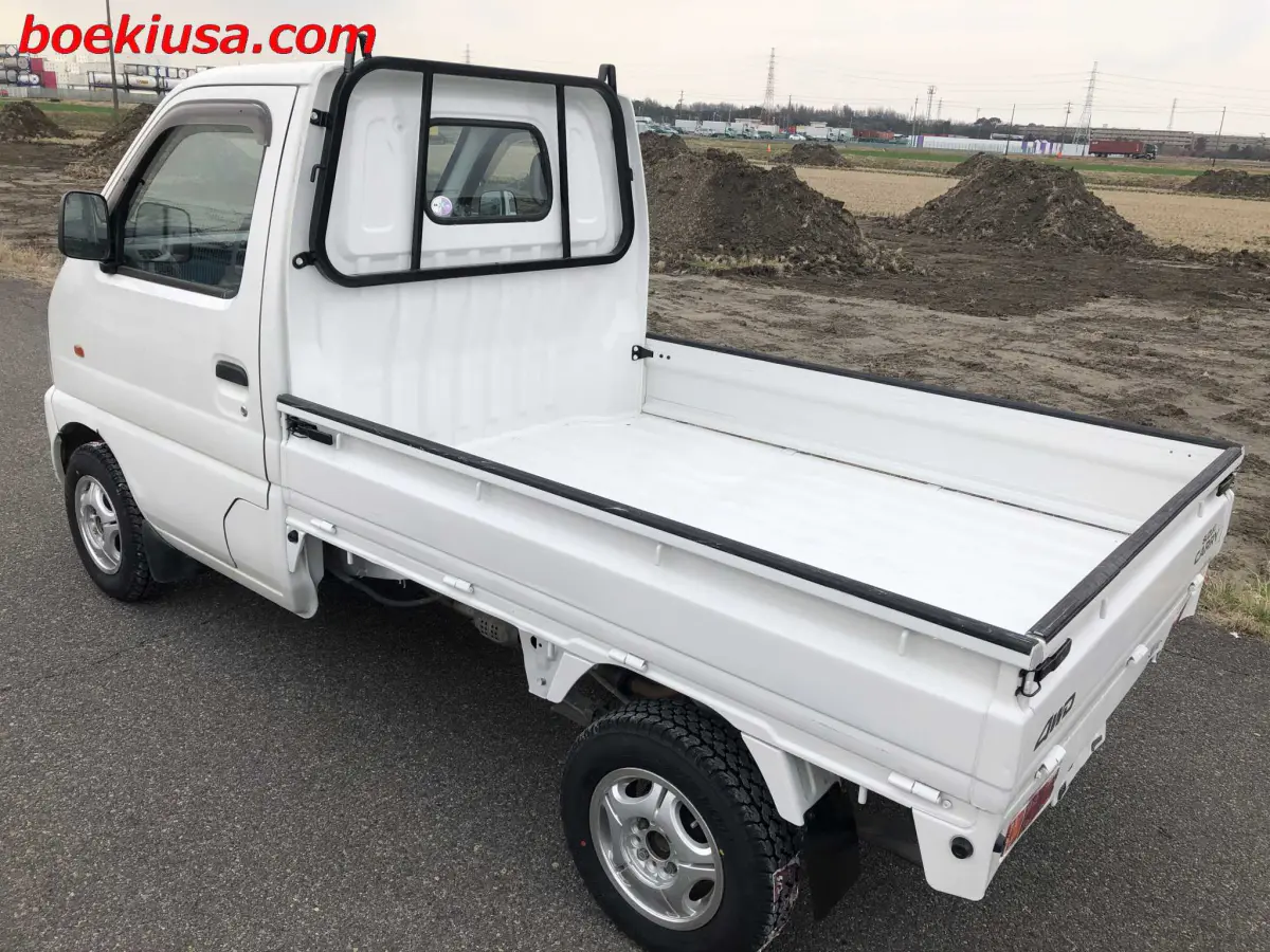 1999 Suzuki Carry 4x4, a white Kei Truck, for sale at Boeki USA in Paterson, NJ (photo 3 of 20)