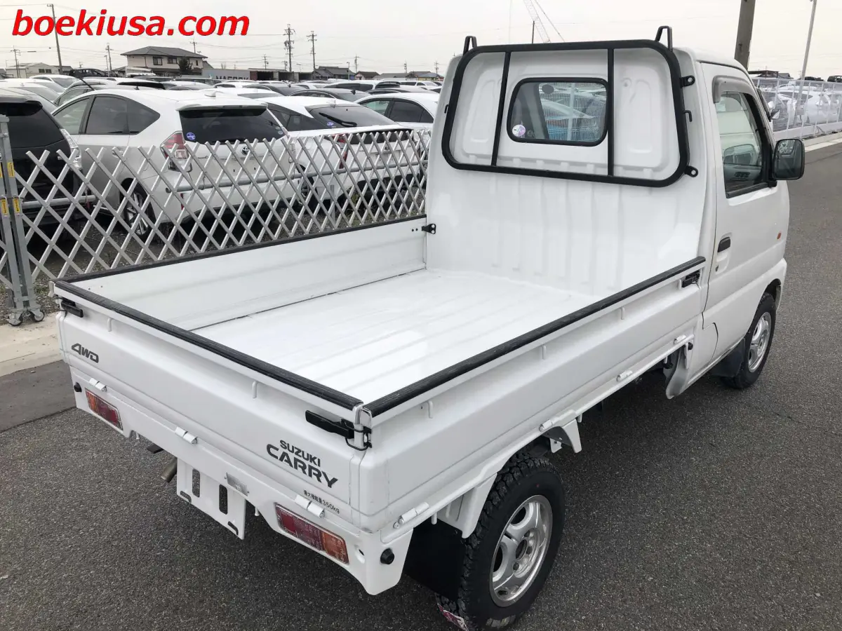 1999 Suzuki Carry 4x4, a white Kei Truck, for sale at Boeki USA in Paterson, NJ (photo 4 of 20)