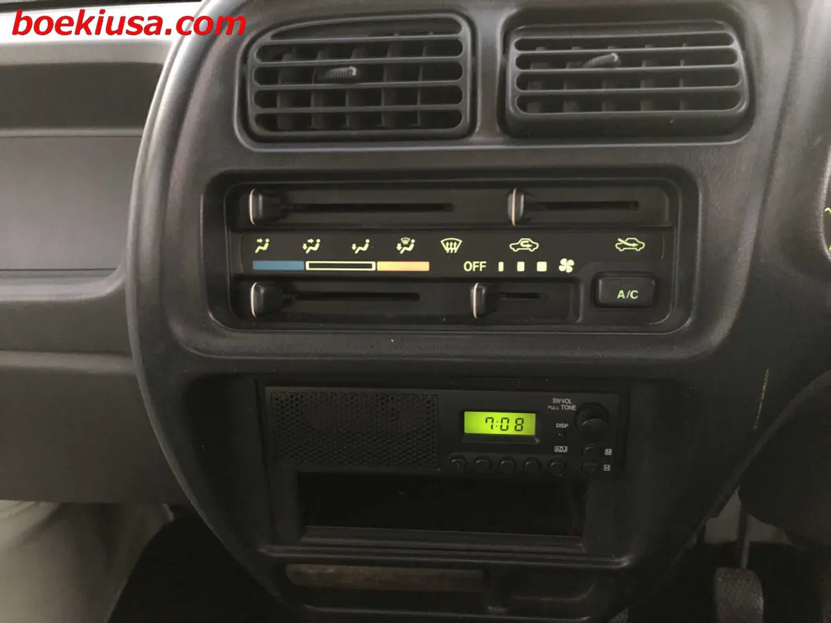 1999 Suzuki Carry 4x4, a white Kei Truck, for sale at Boeki USA in Paterson, NJ (photo 16 of 20)