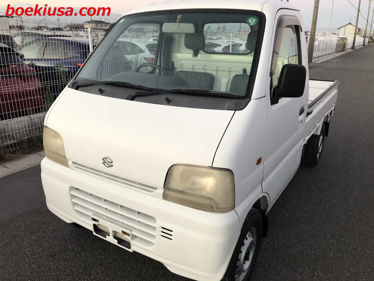 1999 Suzuki Carry 4x4, a white Kei Truck, for sale at Boeki USA in Paterson, NJ (photo 2 of 20)