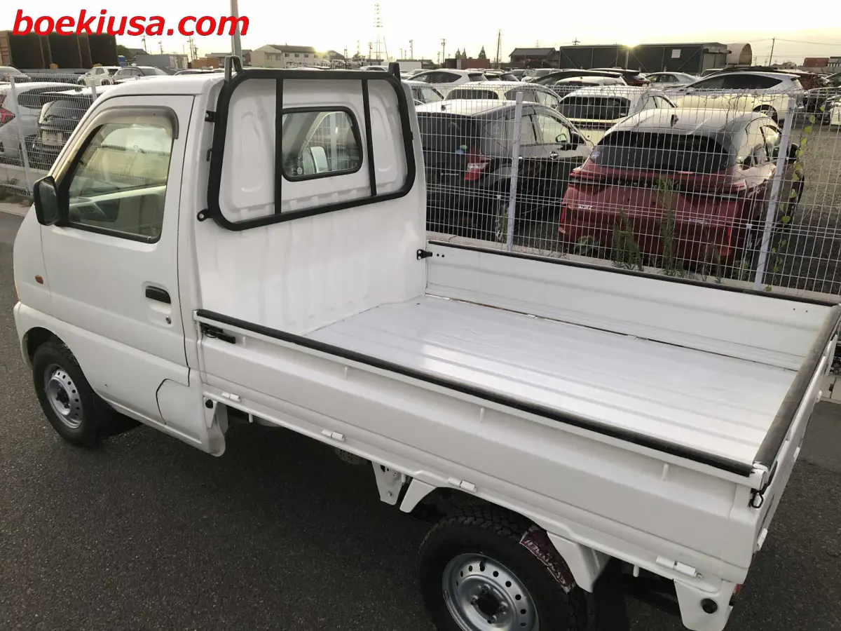 1999 Suzuki Carry 4x4, a white Kei Truck, for sale at Boeki USA in Paterson, NJ (photo 3 of 20)
