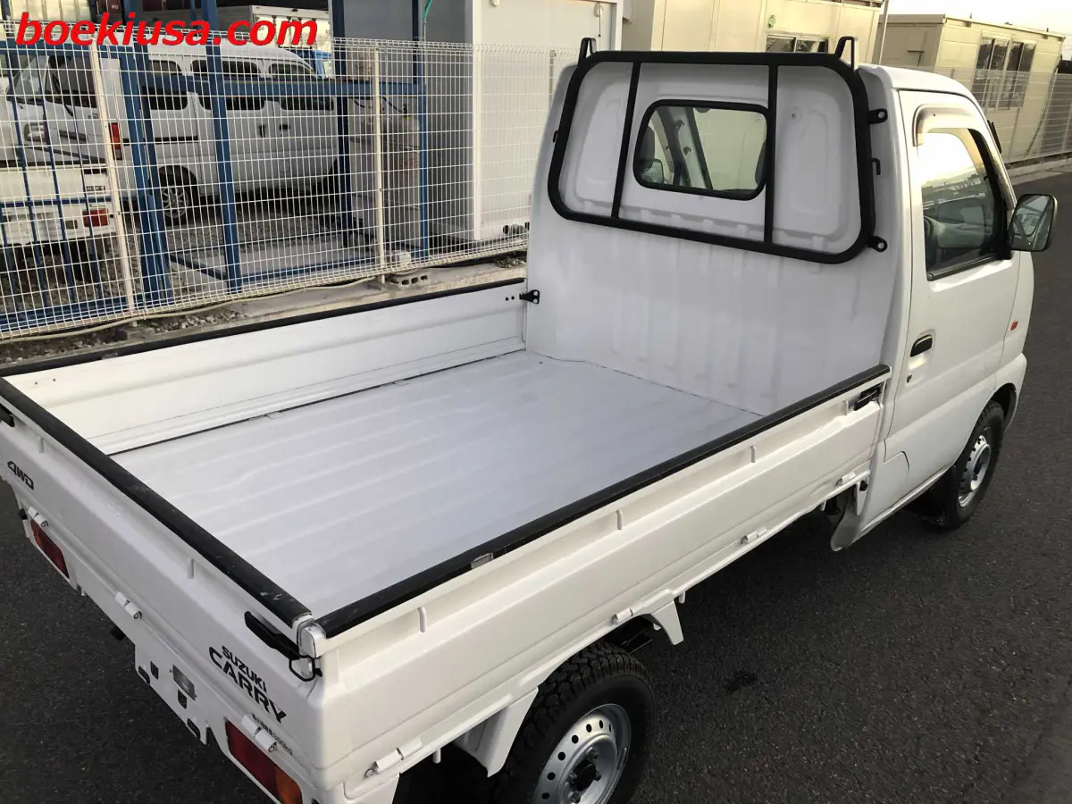 1999 Suzuki Carry 4x4, a white Kei Truck, for sale at Boeki USA in Paterson, NJ (photo 4 of 20)