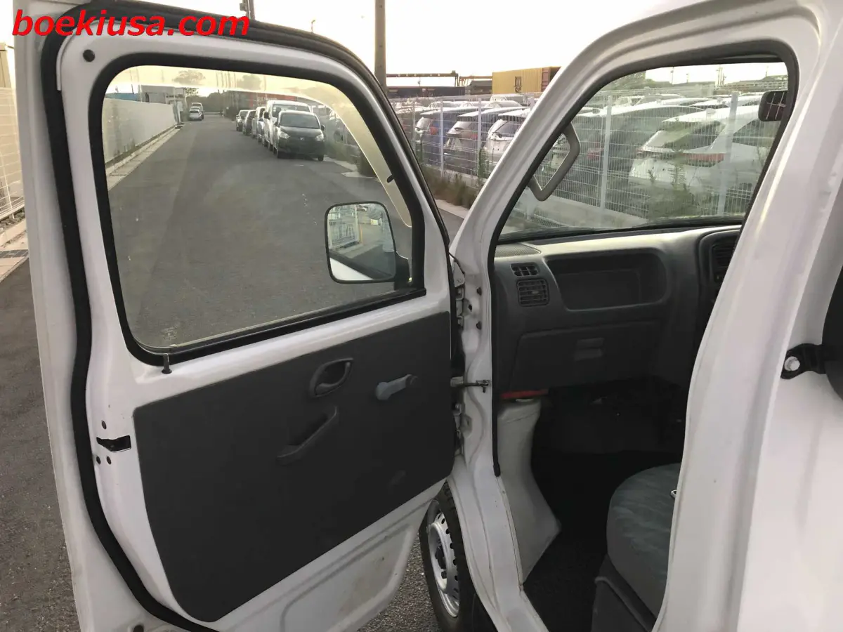 1999 Suzuki Carry 4x4, a white Kei Truck, for sale at Boeki USA in Paterson, NJ (photo 8 of 20)