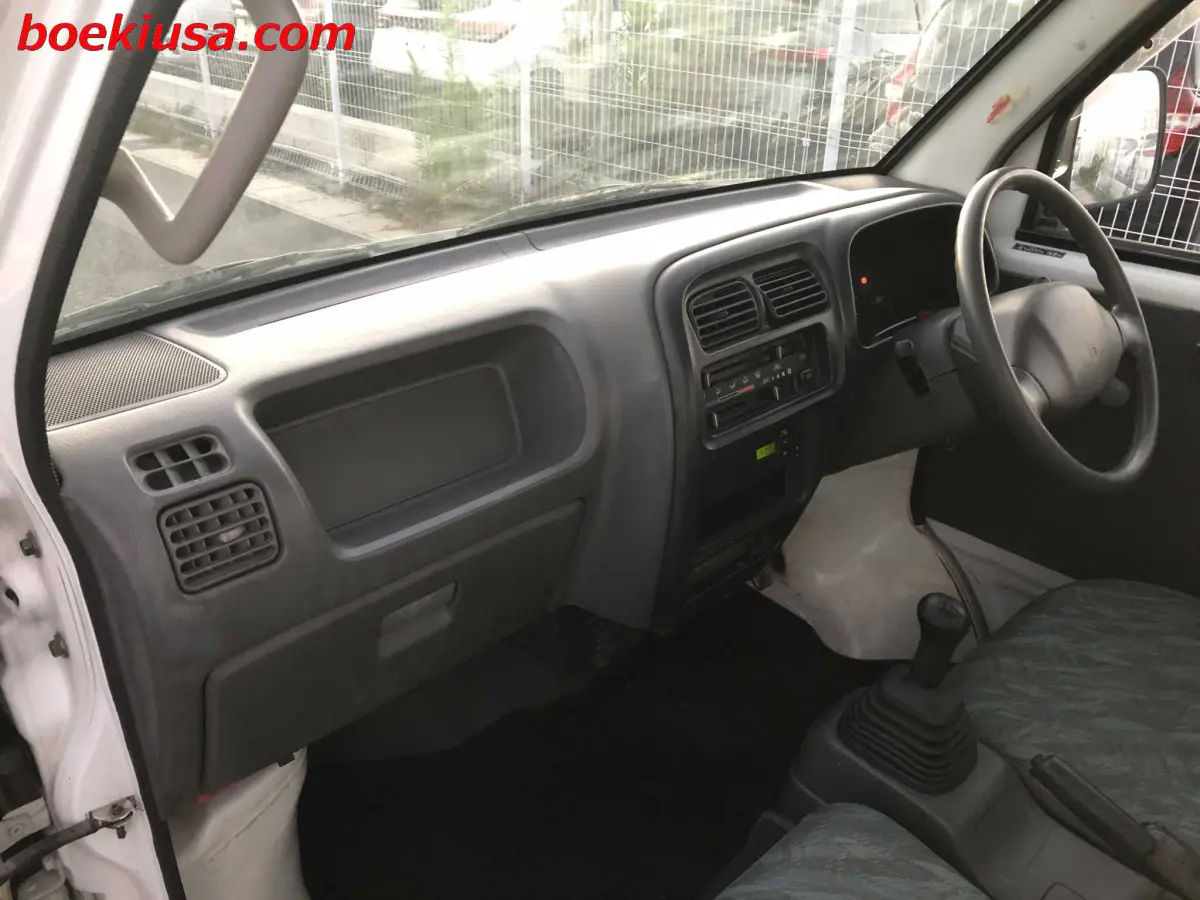 1999 Suzuki Carry 4x4, a white Kei Truck, for sale at Boeki USA in Paterson, NJ (photo 9 of 20)