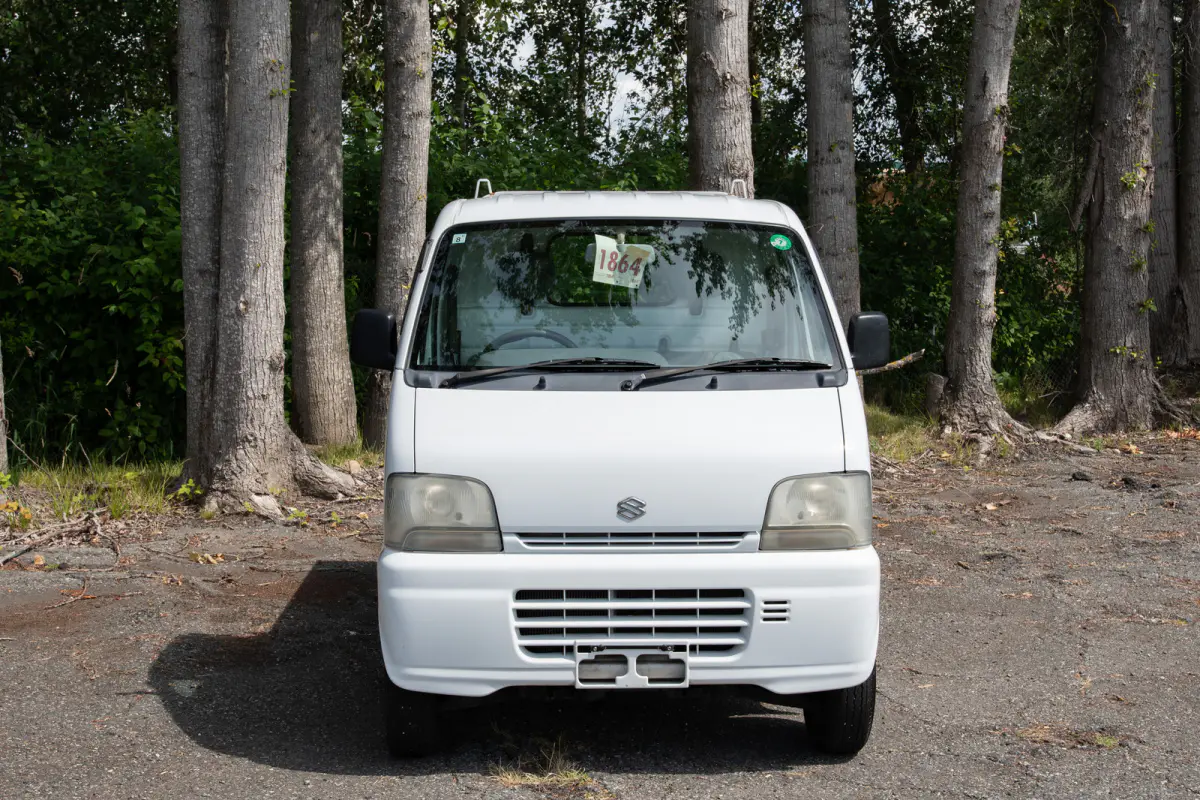 1999 Suzuki Carry Turbo, a gray Kei Truck, for sale at The Import Guys in Ferndale, WA (photo 2 of 12)