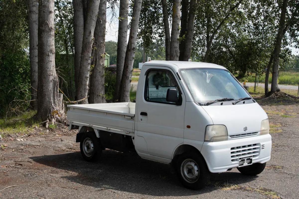 1999 Suzuki Carry Turbo, a gray Kei Truck, for sale at The Import Guys in Ferndale, WA (photo 3 of 12)