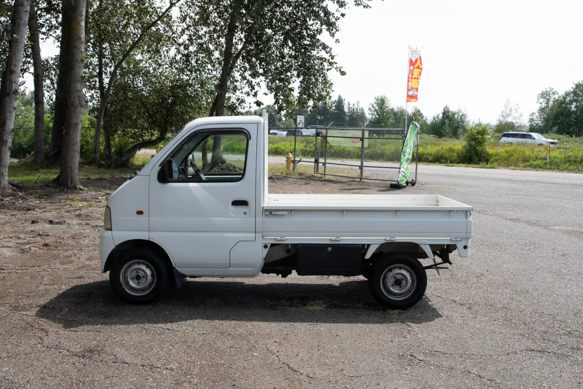 1999 Suzuki Carry Turbo, a gray Kei Truck, for sale at The Import Guys in Ferndale, WA (photo 6 of 12)