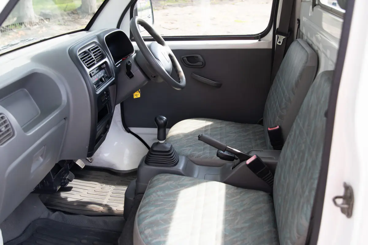1999 Suzuki Carry Turbo, a gray Kei Truck, for sale at The Import Guys in Ferndale, WA (photo 9 of 12)