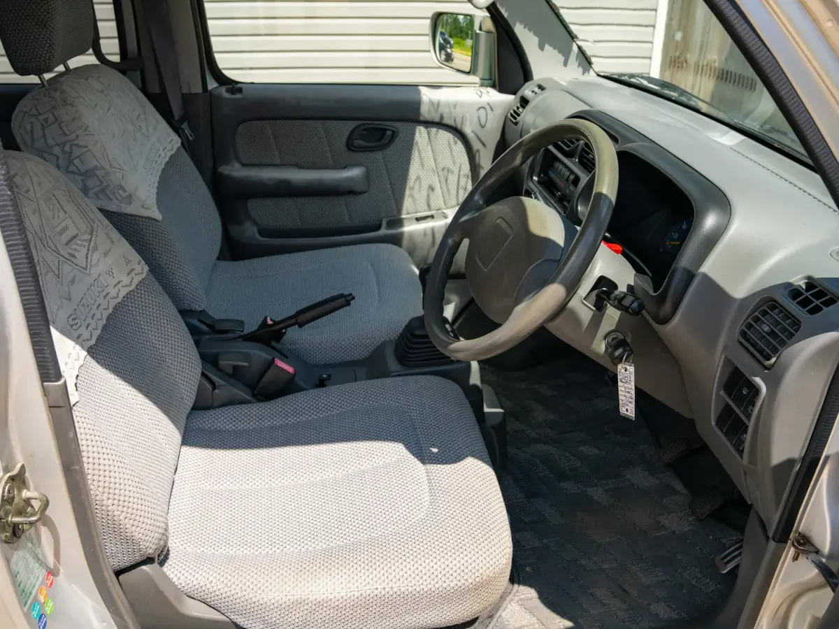 1999 Suzuki Every Van, a silver Kei Van, for sale at Japan Direct Motors in Irmo, SC (photo 11 of 16)