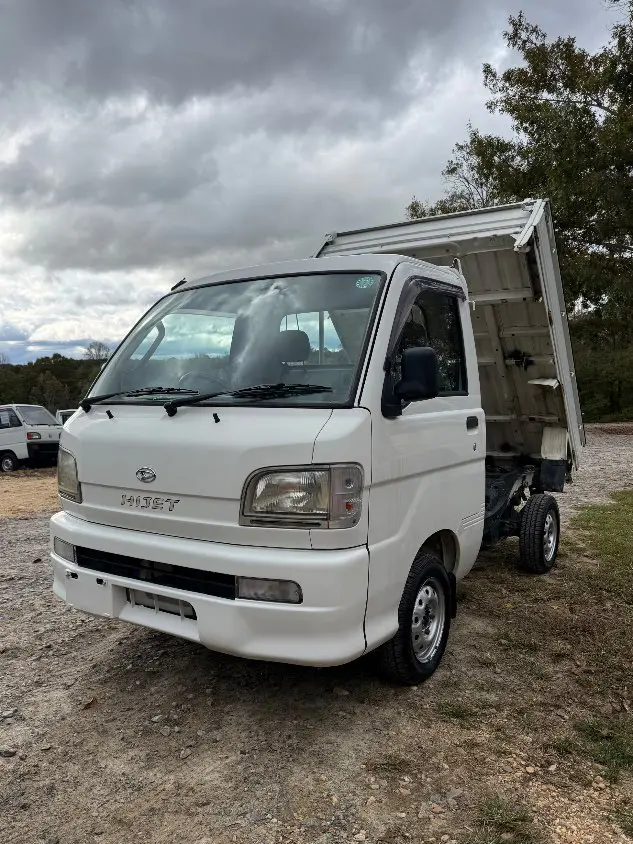 2000 Daihatsu Hijet Dump 4WD, a white Kei Truck, for sale at Mayberry Mini Trucks in Mount Airy, NC (photo 1 of 20)