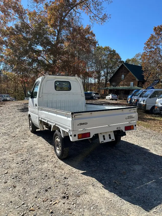 2000 Suzuki Carry 4WD, a white Kei Truck, for sale at Mayberry Mini Trucks in Mount Airy, NC (photo 12 of 20)