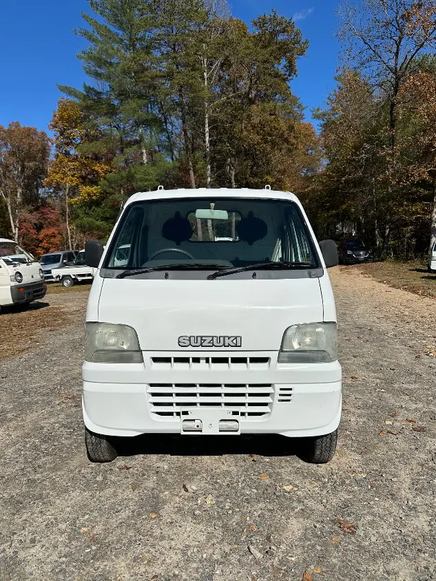2000 Suzuki Carry 4WD, a white Kei Truck, for sale at Mayberry Mini Trucks in Mount Airy, NC (photo 4 of 20)