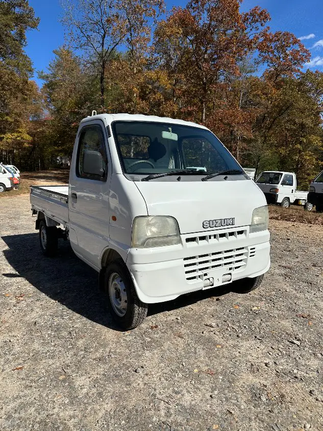 2000 Suzuki Carry 4WD, a white Kei Truck, for sale at Mayberry Mini Trucks in Mount Airy, NC (photo 5 of 20)