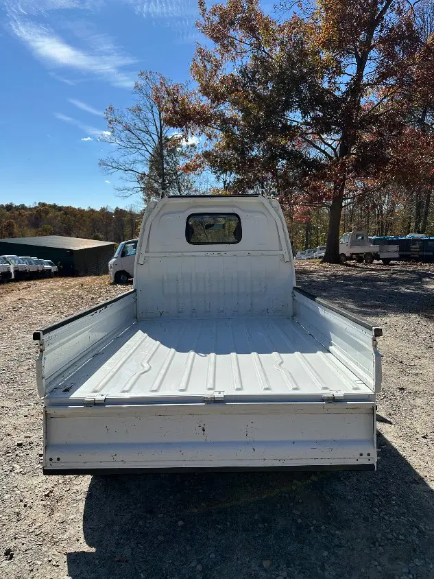 2000 Suzuki Carry 4WD, a white Kei Truck, for sale at Mayberry Mini Trucks in Mount Airy, NC (photo 9 of 20)