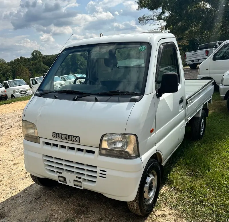 2000 Suzuki Carry 4WD, a white Kei Truck, for sale at Mayberry Mini Trucks in Mount Airy, NC (photo 1 of 12)