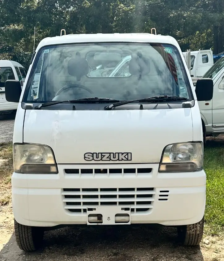2000 Suzuki Carry 4WD, a white Kei Truck, for sale at Mayberry Mini Trucks in Mount Airy, NC (photo 2 of 12)