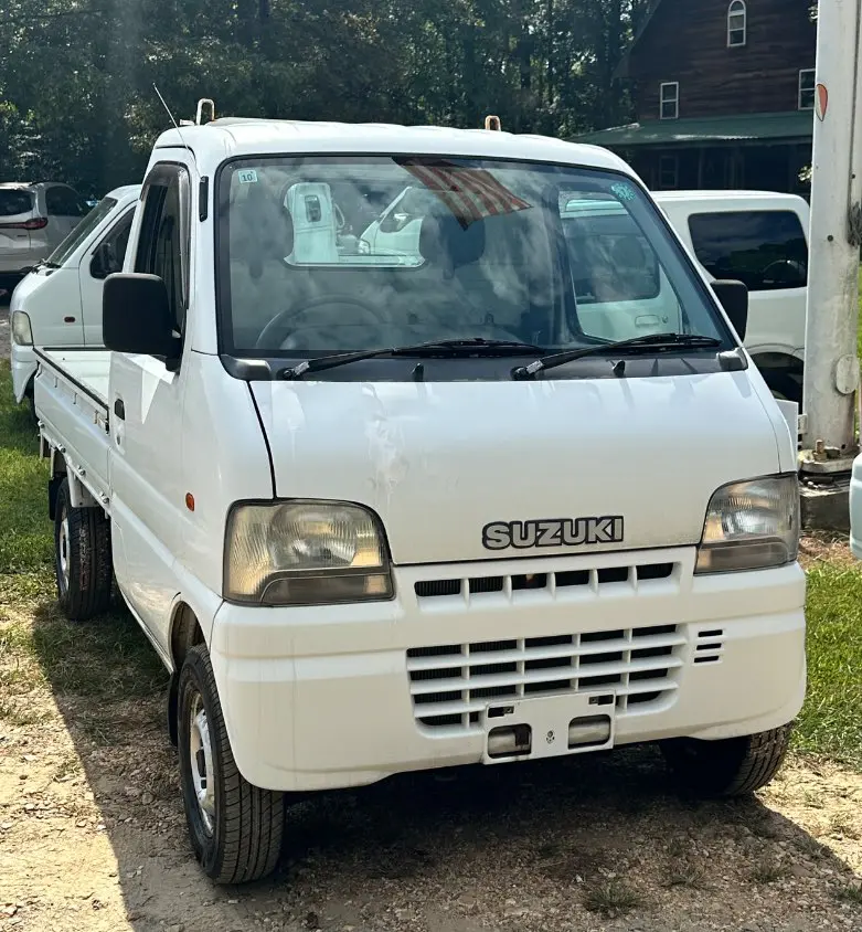 2000 Suzuki Carry 4WD, a white Kei Truck, for sale at Mayberry Mini Trucks in Mount Airy, NC (photo 3 of 12)
