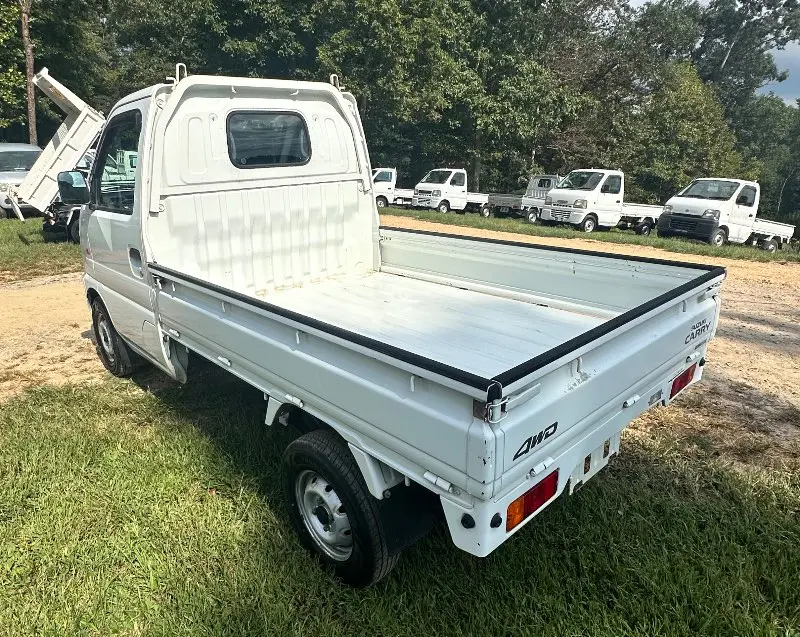 2000 Suzuki Carry 4WD, a white Kei Truck, for sale at Mayberry Mini Trucks in Mount Airy, NC (photo 6 of 12)