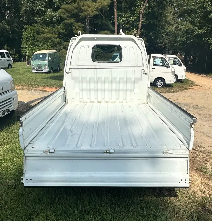 2000 Suzuki Carry 4WD, a white Kei Truck, for sale at Mayberry Mini Trucks in Mount Airy, NC (photo 7 of 12)