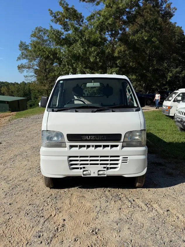 2000 Suzuki Carry 4WD, a white Kei Truck, for sale at Mayberry Mini Trucks in Mount Airy, NC (photo 2 of 16)