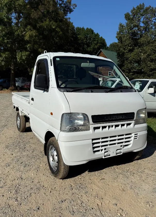 2000 Suzuki Carry 4WD, a white Kei Truck, for sale at Mayberry Mini Trucks in Mount Airy, NC (photo 3 of 16)