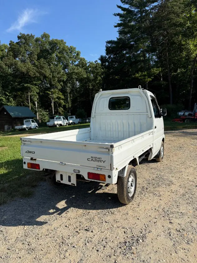 2000 Suzuki Carry 4WD, a white Kei Truck, for sale at Mayberry Mini Trucks in Mount Airy, NC (photo 5 of 16)