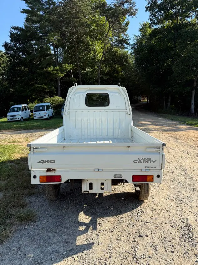 2000 Suzuki Carry 4WD, a white Kei Truck, for sale at Mayberry Mini Trucks in Mount Airy, NC (photo 6 of 16)