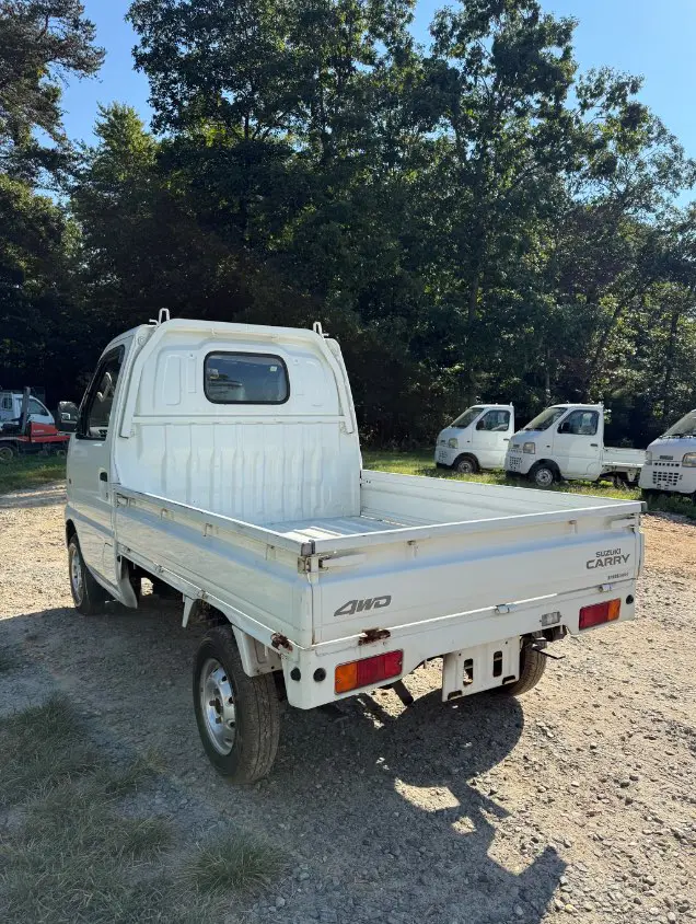 2000 Suzuki Carry 4WD, a white Kei Truck, for sale at Mayberry Mini Trucks in Mount Airy, NC (photo 7 of 16)