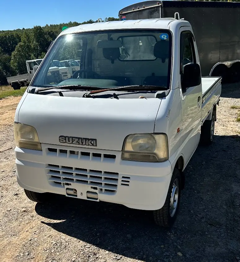 2000 Suzuki Carry 4WD, a white Kei Truck, for sale at Mayberry Mini Trucks in Mount Airy, NC (photo 1 of 18)