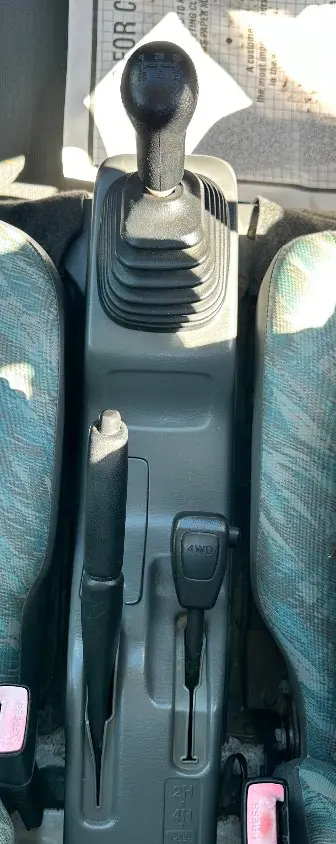 2000 Suzuki Carry 4WD, a white Kei Truck, for sale at Mayberry Mini Trucks in Mount Airy, NC (photo 12 of 18)