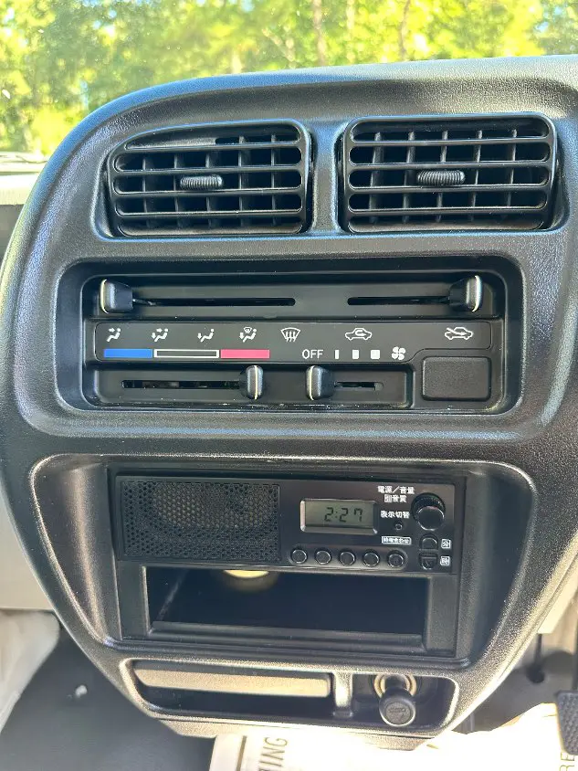 2000 Suzuki Carry 4WD, a white Kei Truck, for sale at Mayberry Mini Trucks in Mount Airy, NC (photo 13 of 18)