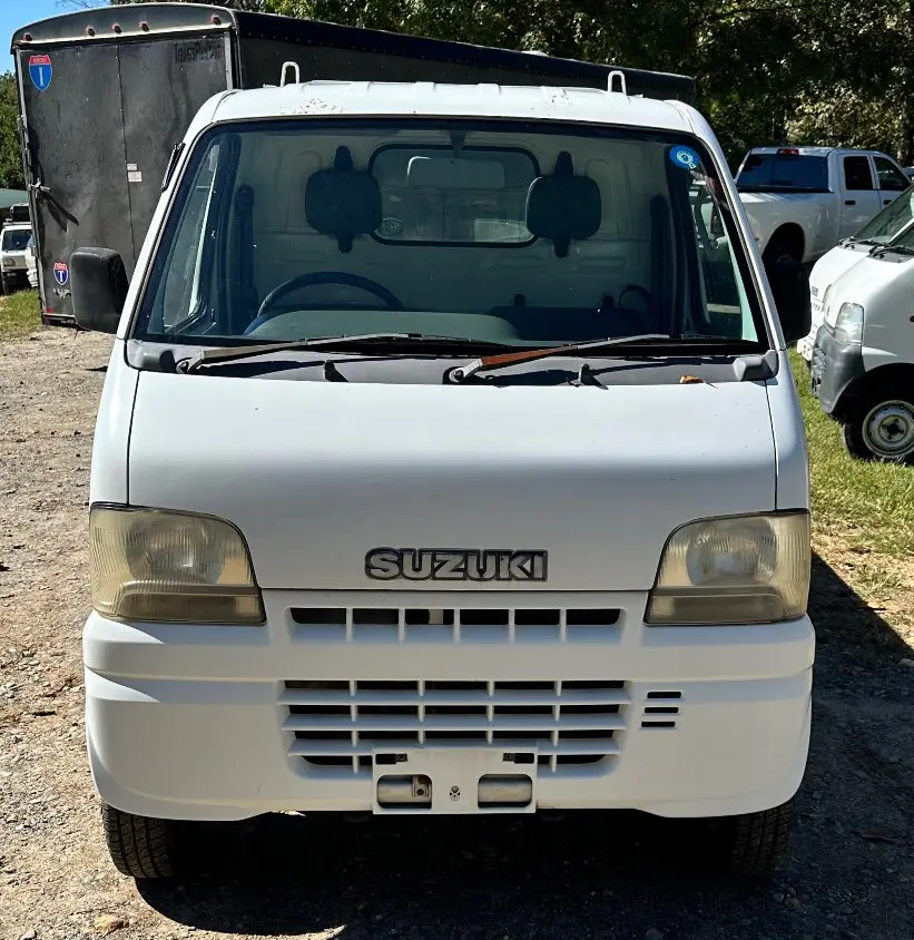 2000 Suzuki Carry 4WD, a white Kei Truck, for sale at Mayberry Mini Trucks in Mount Airy, NC (photo 2 of 18)