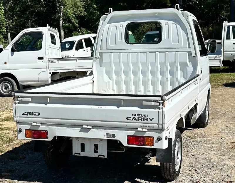 2000 Suzuki Carry 4WD, a white Kei Truck, for sale at Mayberry Mini Trucks in Mount Airy, NC (photo 5 of 18)